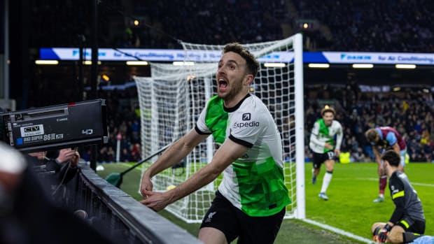 Diogo Jota pictured celebrating after scoring the 50th goal of his Liverpool career in a 2-0 win at Burnley on Boxing Day in 2023
